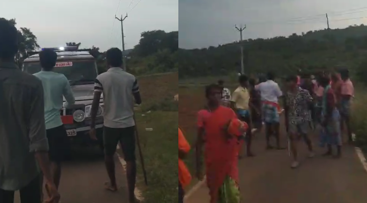  மலை கிராம மக்களிடையே மோதல் - போலீஸ் வாகனத்தை முற்றுகையிட்டதால் பரபரப்பு 