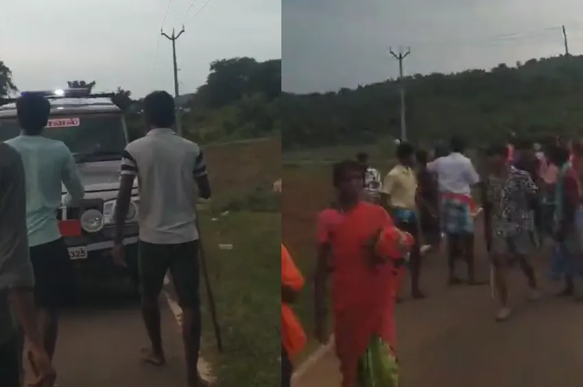  மலை கிராம மக்களிடையே மோதல் - போலீஸ் வாகனத்தை முற்றுகையிட்டதால் பரபரப்பு 